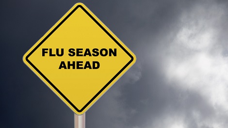 Sign saying flu season ahead.