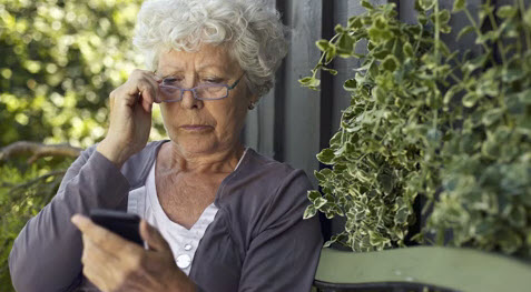 Elderly woman with bad eyesight