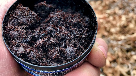 A can of smokeless tobacco dip.