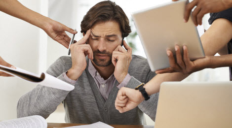 Man stressed at work.