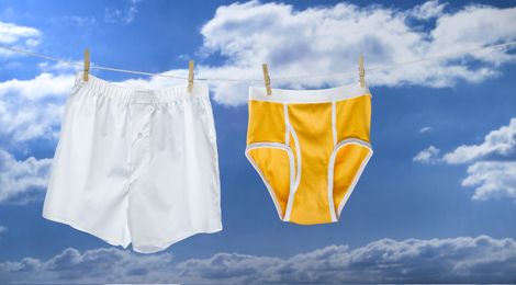 Boxers and briefs hanging on a laundry line