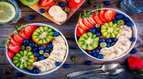 Bowls of fruit on a table.