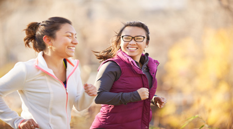 Two friends running and working out. 