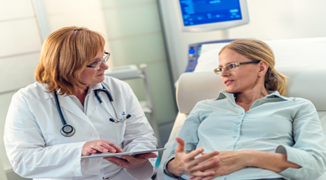 Doctor discussing illnesses with her patient. 