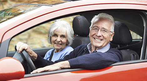 Older adults driving in a car.