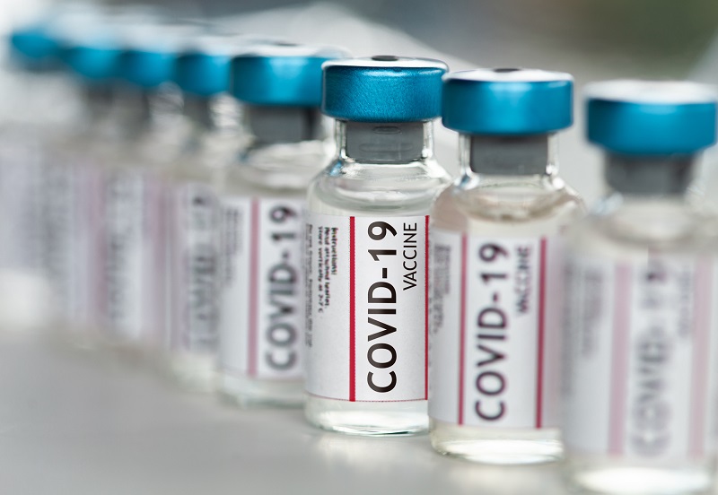 image of vaccine vials with COVID-19 labels