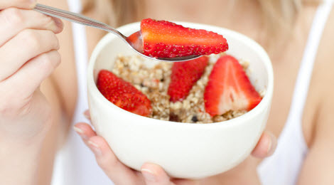 A bowl of strawberries and oatmeal