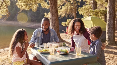 Family camping outdoors.