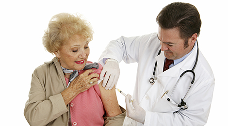 Adults getting a flu shot. 