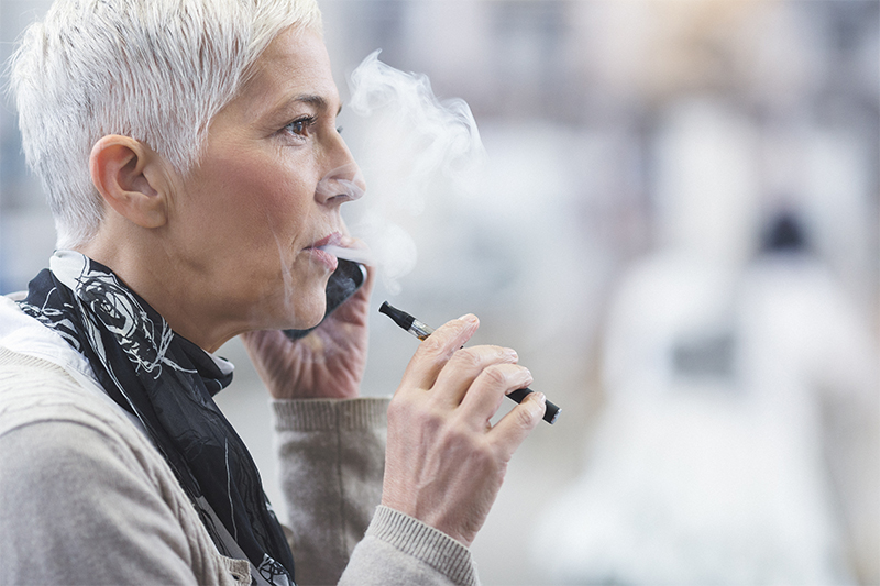 Woman vaping.