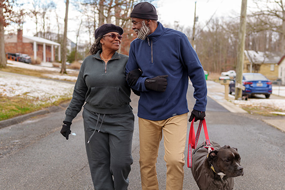 Family walking down street