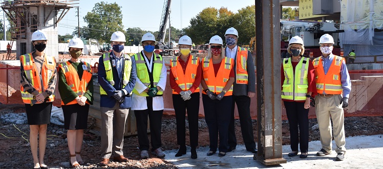 Piedmont Athens joined donors to set first steel column for new patient tower. 