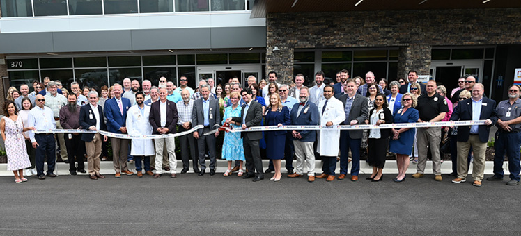 Group photo of ribbon cutting