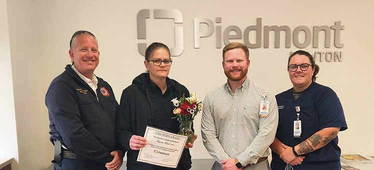 A group of people with hero Suzanne Ward