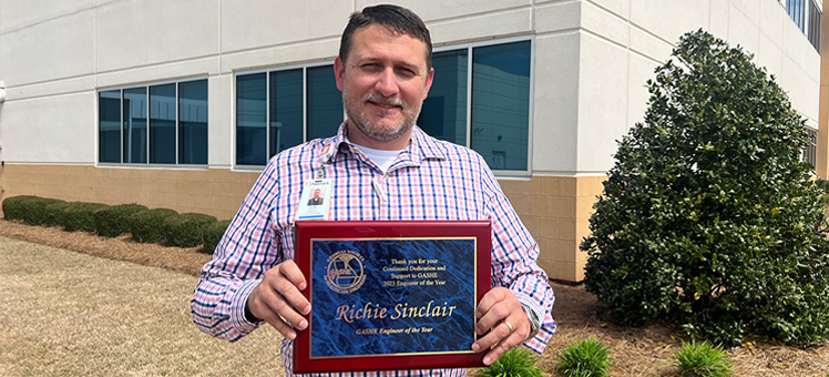 Richie Sinclair with award