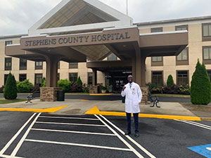 A doctor standing in front of Stephens County Hospital