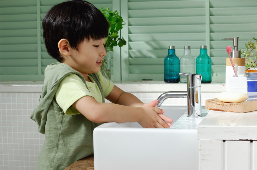 Child washing hands