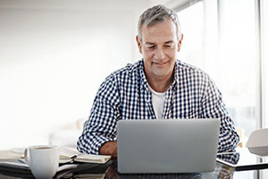 Older man on computer