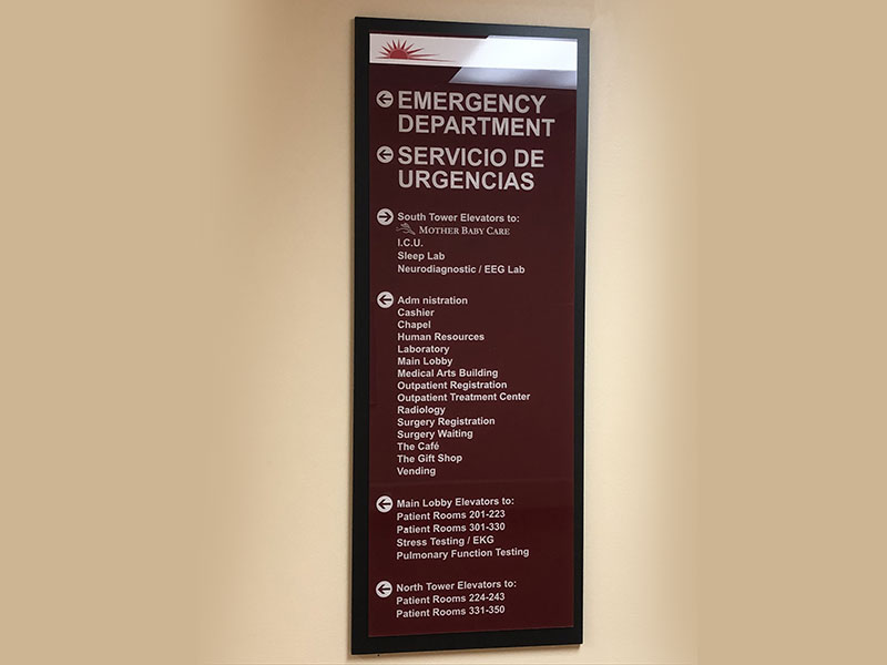 Image of a hospital sign with directions